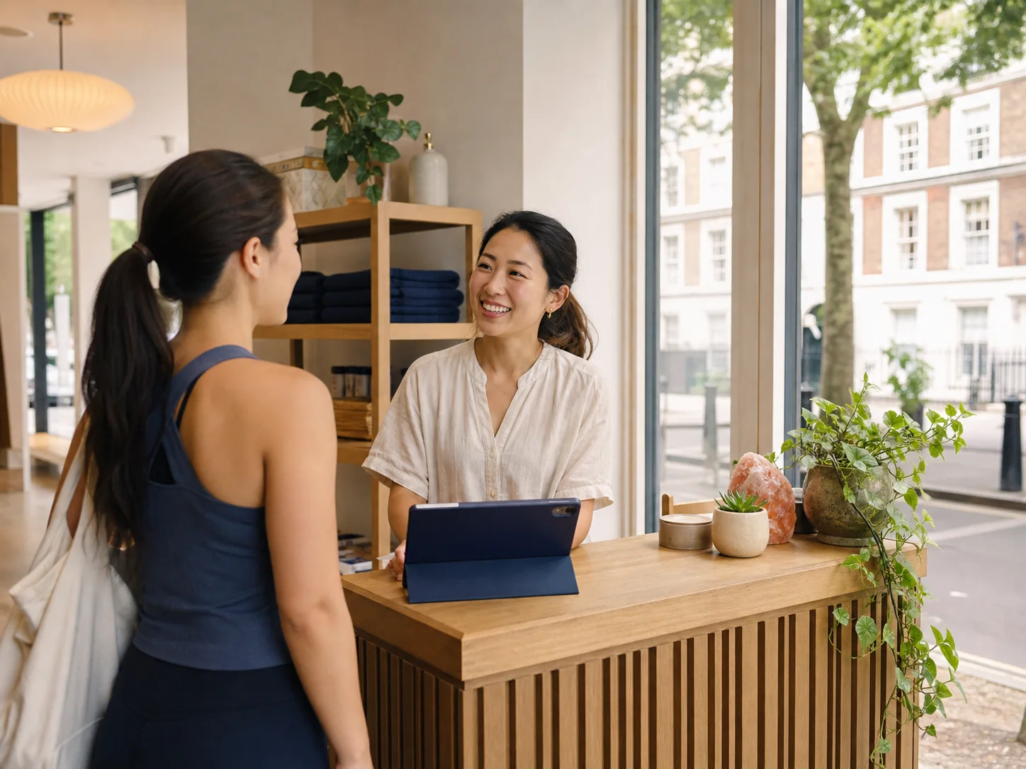 UK wellness business owner welcoming a customer